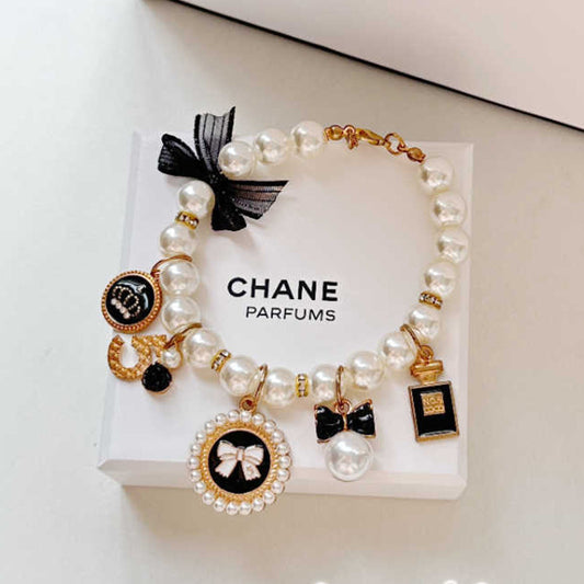 Black 4-PCS Pearl Charm Pet Necklace - Adjustable Bowknot Collar for Small Dogs & Cats (S: 20+5CM) - Pets Preference